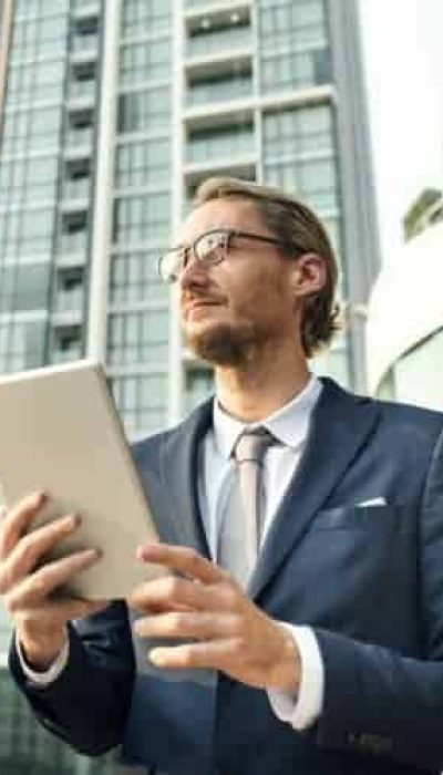 businessman-working-connecting-tablet-concept-e1631573660947.jpg